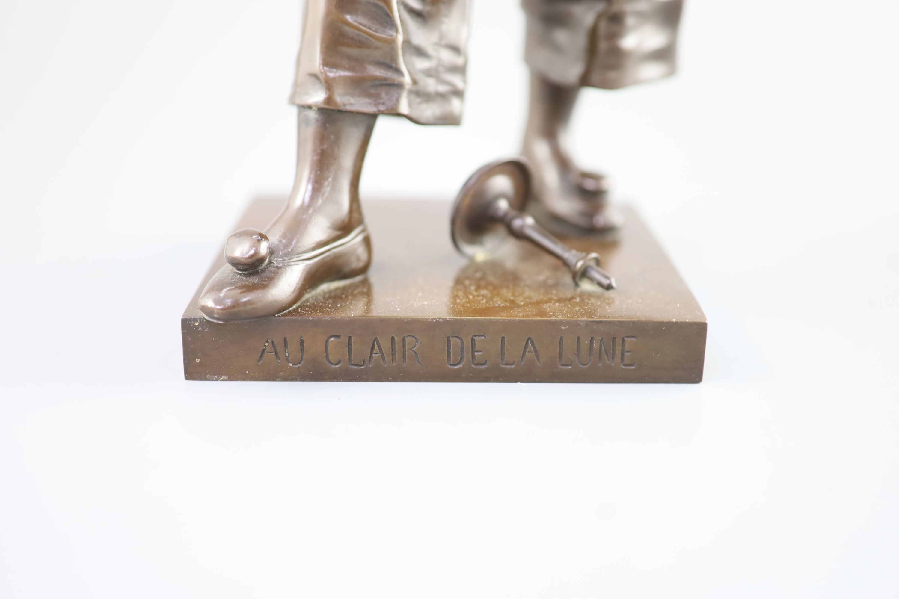 Eutrope Bouret (1833-1906) a bronze figure; ‘Au Clair de la Lune’, 46cm high.